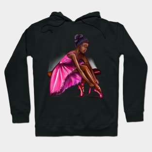 ballerina getting ready to dance, lacing her ballet shoes - brown skin ballerina. Top 10 Best ballerina gifts. Top 10 gifts for black women Hoodie